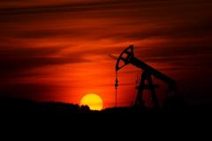 An oil well at sunset 