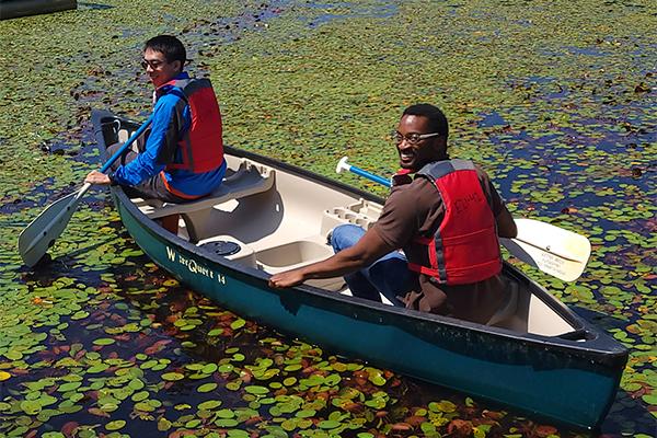 Graduate students canoeing