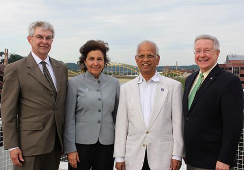 Robert Voigt, A. "Ravi" Ravindran and Russell Barton are congratulated on their awards by Janis Terpenny, Peter and Angela Dal Pezzo Chair and Department Head.