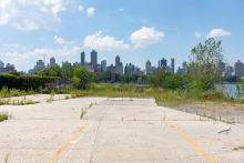 A vacant lot in Queens sits across the East River from Manhattan, New York